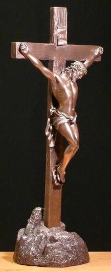 Krzyż postacią Jezusa na podstawce